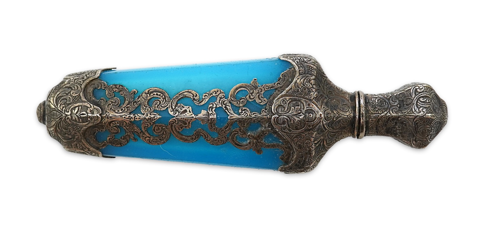 A late 19th century French white metal mounted and overlaid blue opaline glass scent flask